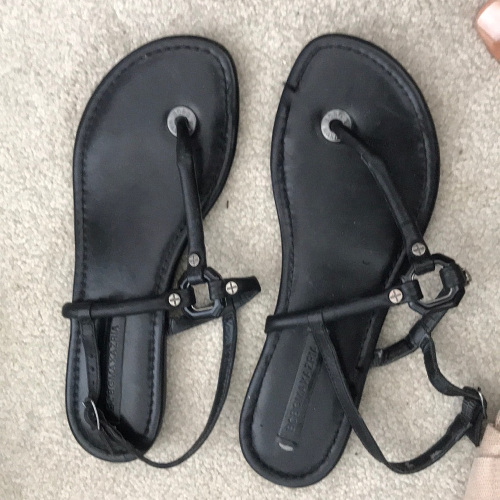 Black t-strap BCBG flat sandals